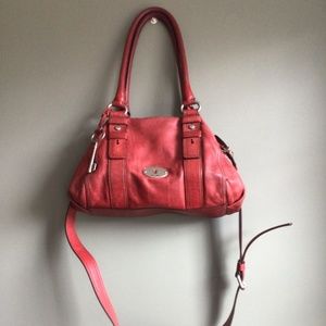 Fossil satchel purse  in red, all zippers and strap in excellent condition.